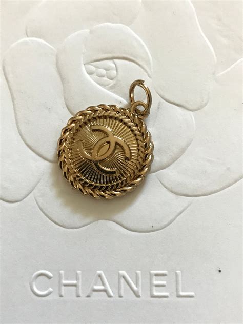 Chanel button zipper pull